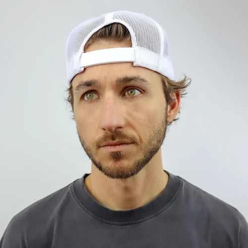 Mike Jakubowski, founder of MSW, wearing a white MSW Trucker backwards